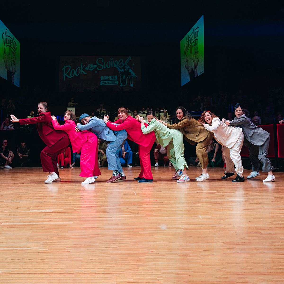 Jazzifiers lined up in colourful outfits performing at RTSF Saturday Night